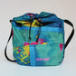 Upcycled tent cross-body bag with color splash details made from tents