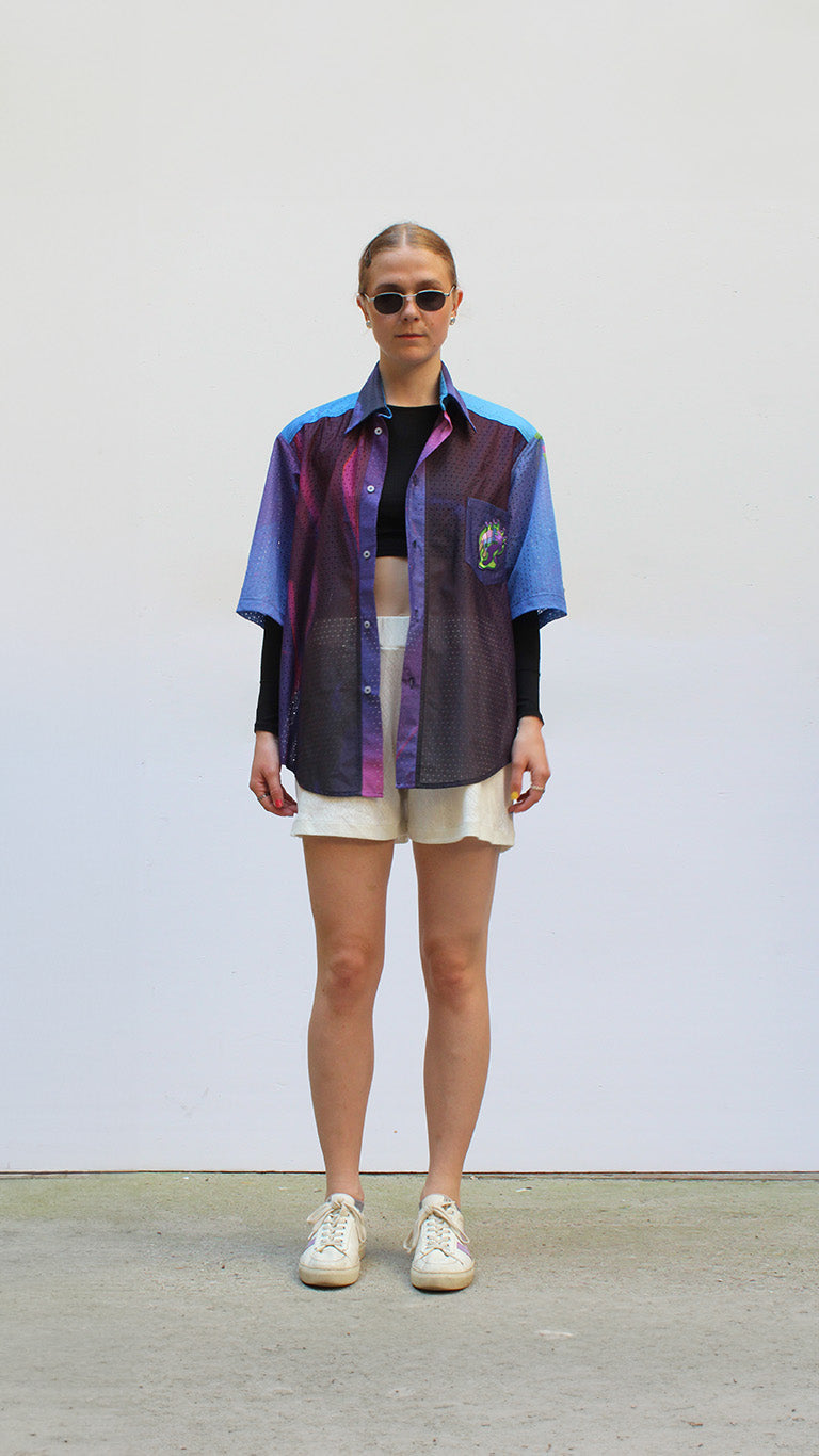 Upcycled banner shirt with embroidery