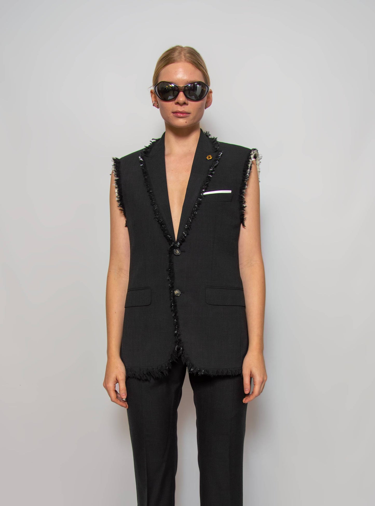 Ripped tailored vest