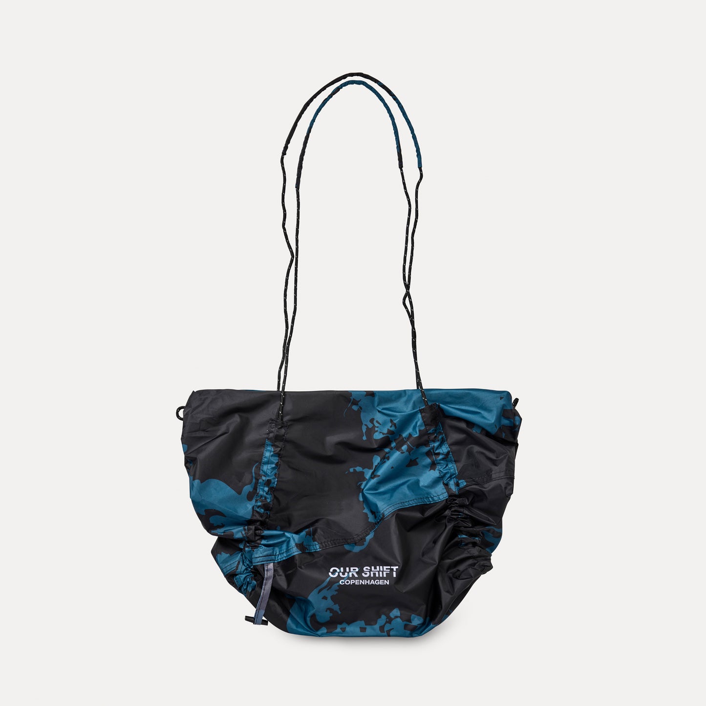 PRINTED DRAWSTRING SLING TOTE