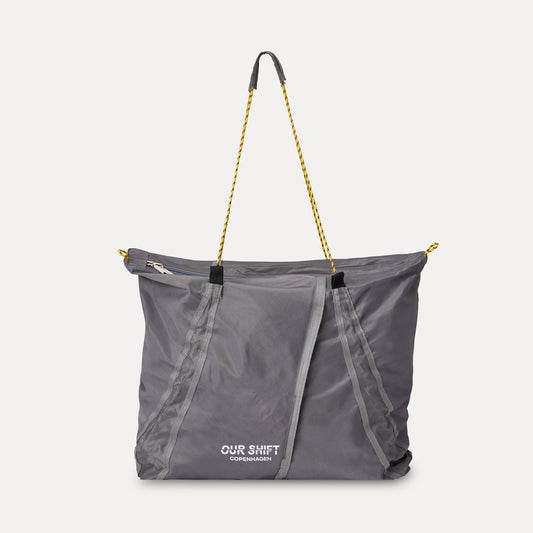 PRINTED DRAWSTRING SLING TOTE