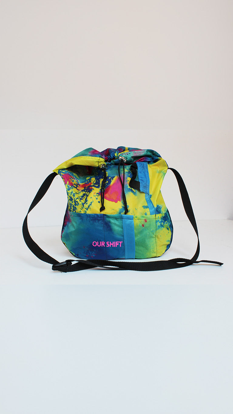 Upcycled tent cross-body bag with color splash details made from tents