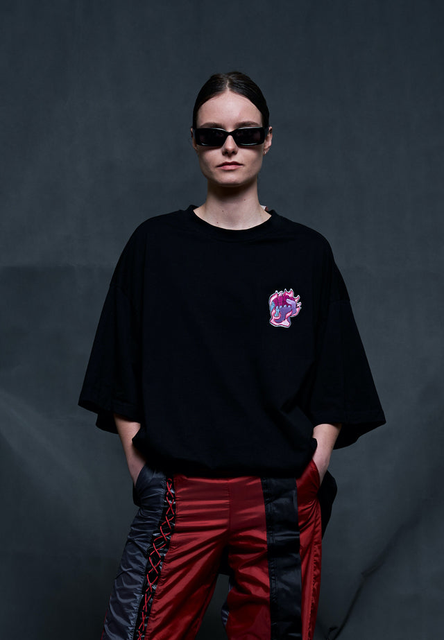 Black T-SHIRT with activist embroidery detail