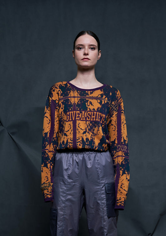 Activist orange sweatshirt with the slogan "GIVE A SHIFT"