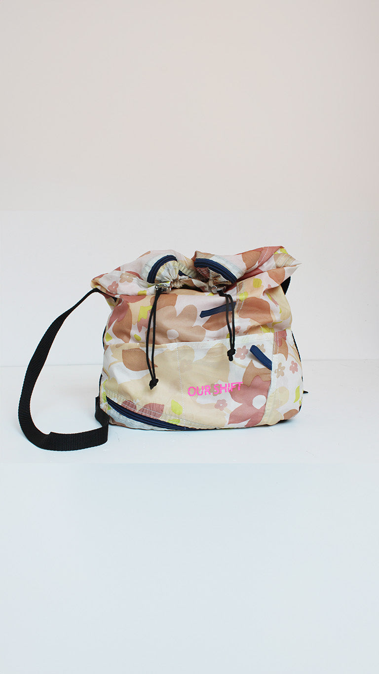 Upcycled tent cross-body bag with flower details made from tents