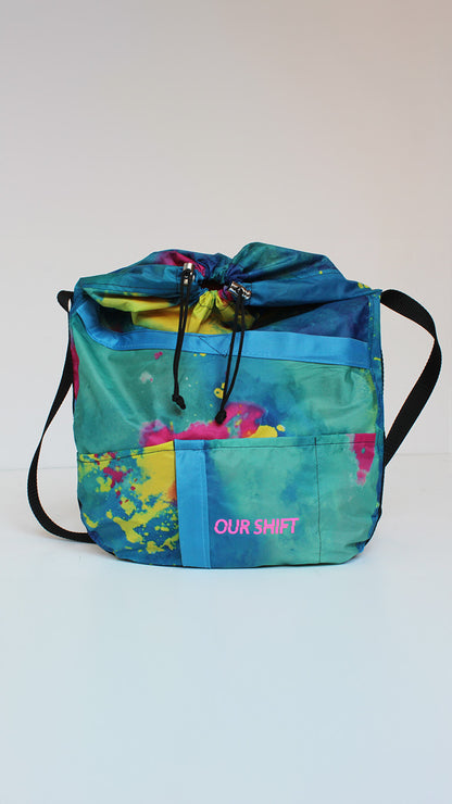 Upcycled tent cross-body bag with color splash details made from tents