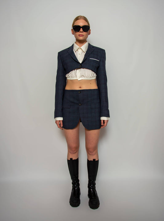 Upcycled cropped blazer with a mini skirt with darted tailoring ensuring adjustability to fit the waist