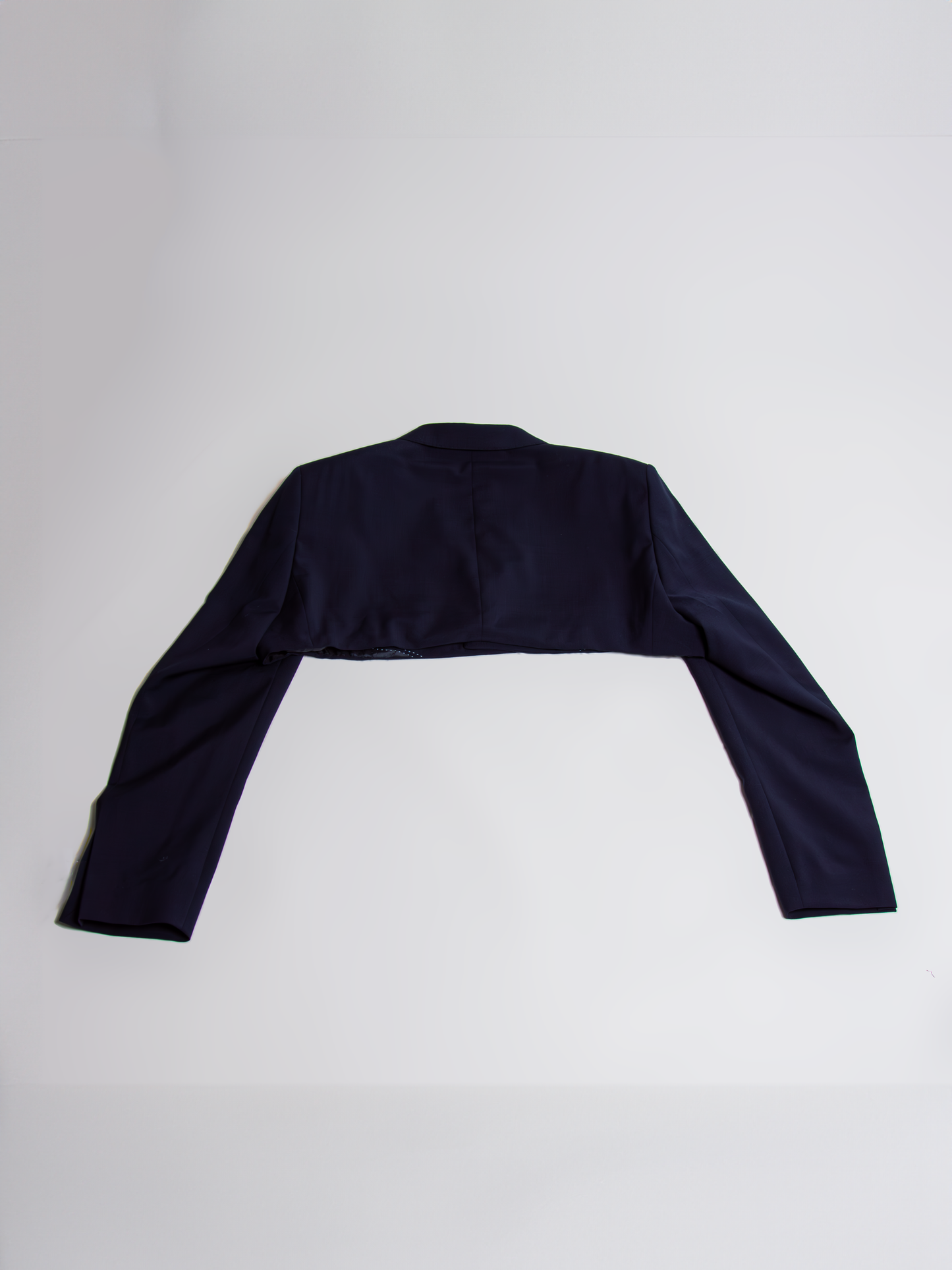 Cropped blazer with mini skirt