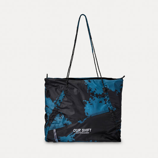 PRINTED DRAWSTRING SLING TOTE