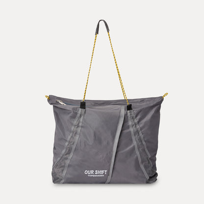 PRINTED DRAWSTRING SLING TOTE