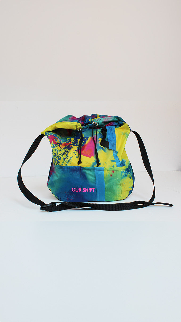 Upcycled tent cross-body bag with color splash details made from tents 