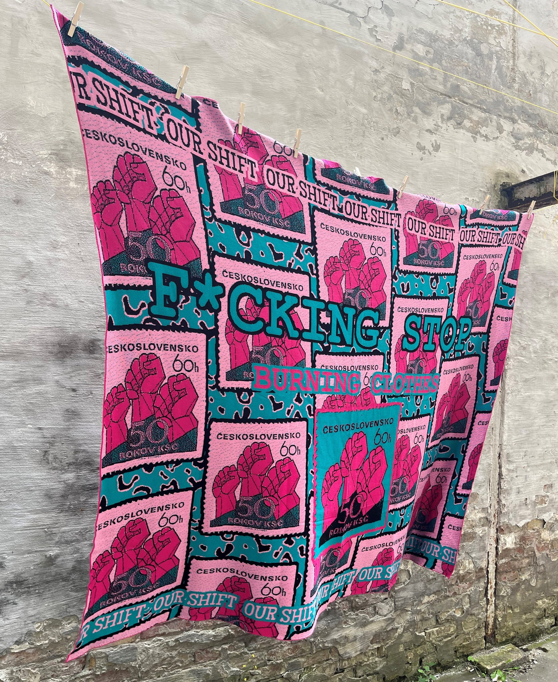 Activistic pink blanket made of 100% cotton with a powerful message "F*cking Stop Burning Clothes"