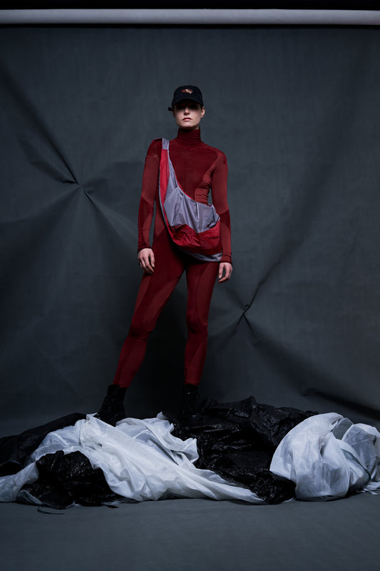 Blood red BODYSUIT with color-patch details 